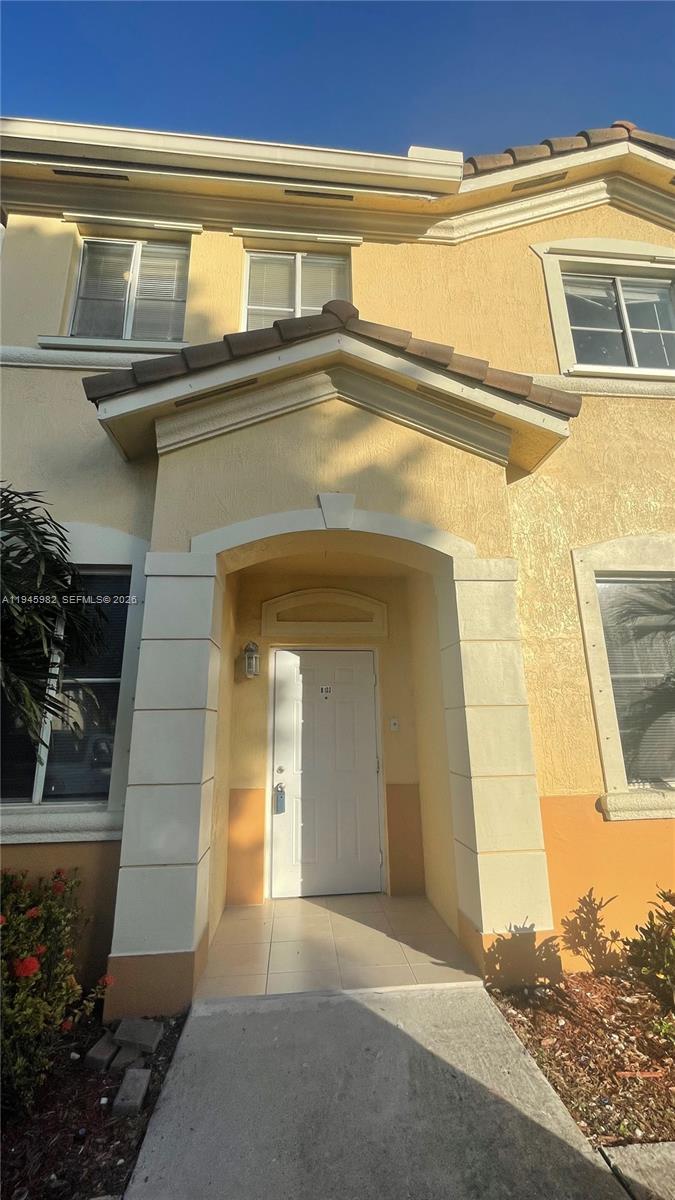 7020 Northwest 177th Street, Unit B103 Hialeah, FL 33015 - Photo 27 of 53 a view of front door