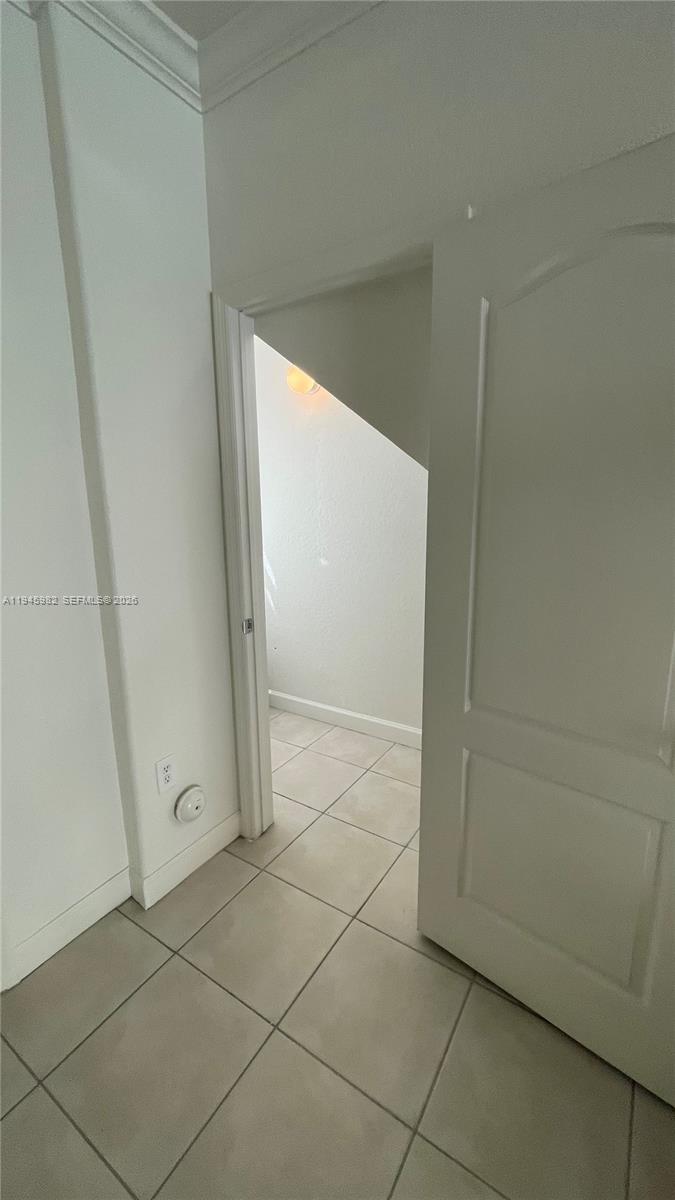 7020 Northwest 177th Street, Unit B103 Hialeah, FL 33015 - Photo 31 of 53 a view of a hallway