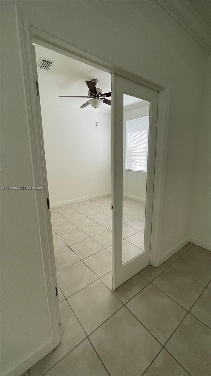 7020 Northwest 177th Street, Unit B103 Hialeah, FL 33015 - Photo 33 of 53 a view of an empty room