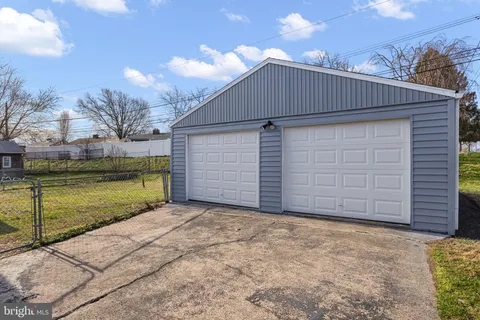 a view of an empty room with windows