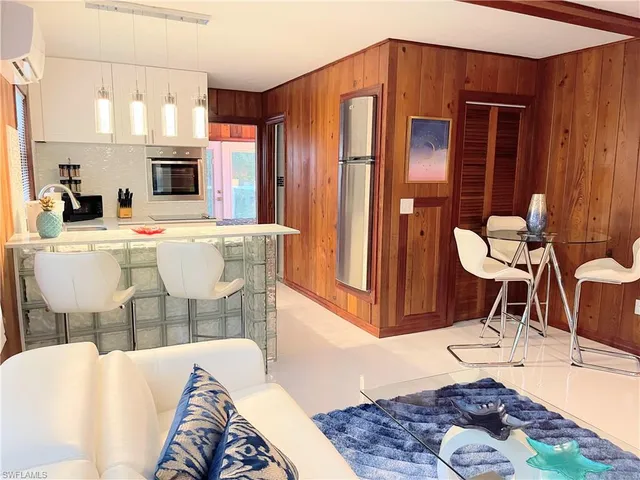 a living room with a couch and a table