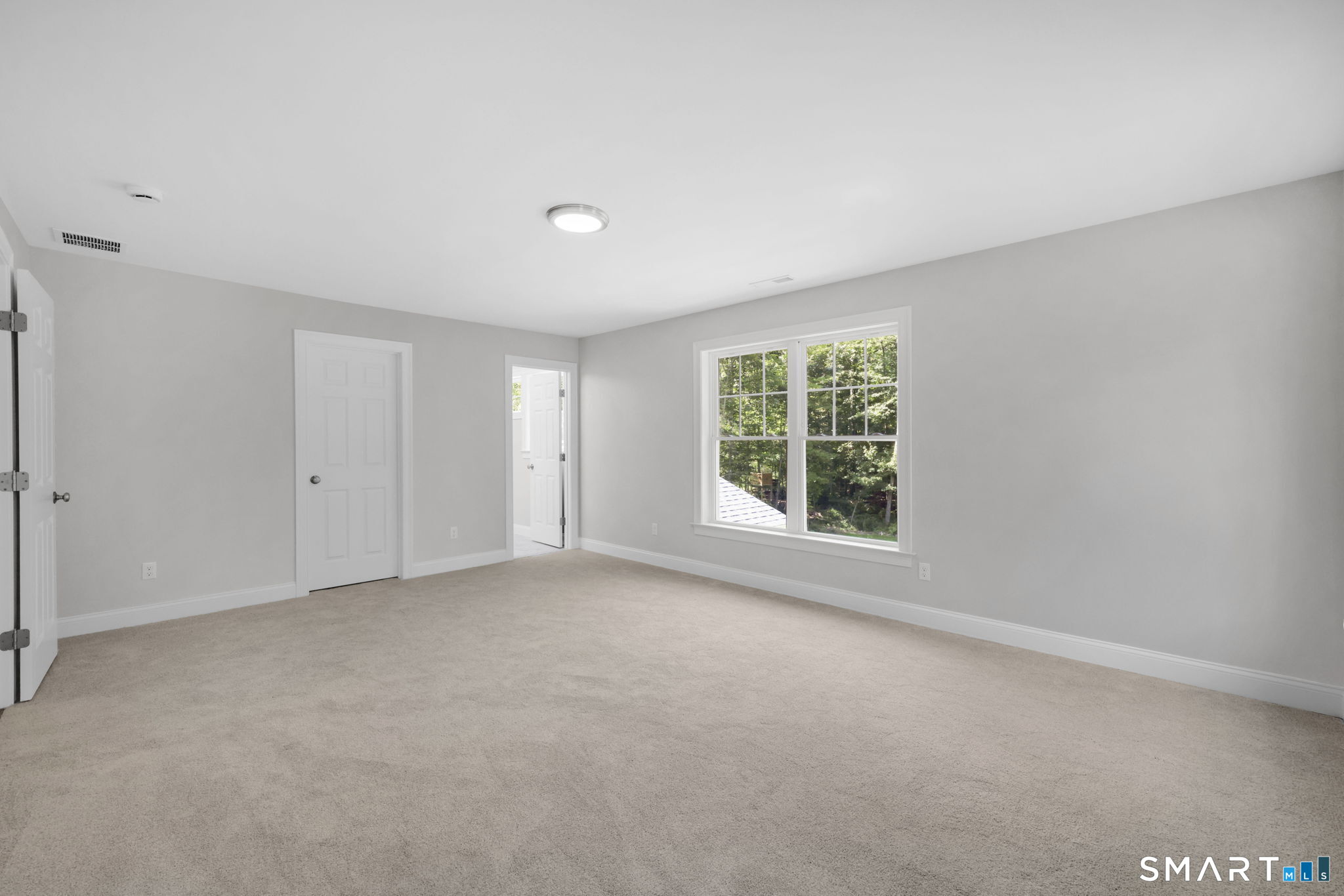 43 Wyllys Farm Road Storrs Mansfield, CT 06268 - Photo 24 of 40 a view of an empty room with a window