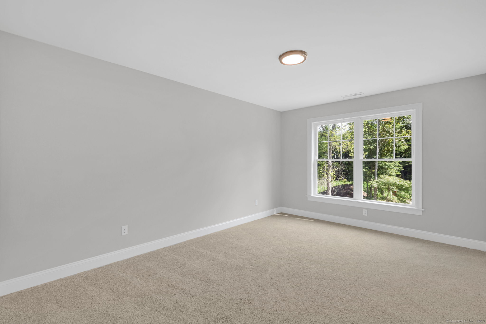 43 Wyllys Farm Road Storrs Mansfield, CT 06268 - Photo 29 of 40 an empty room with a window