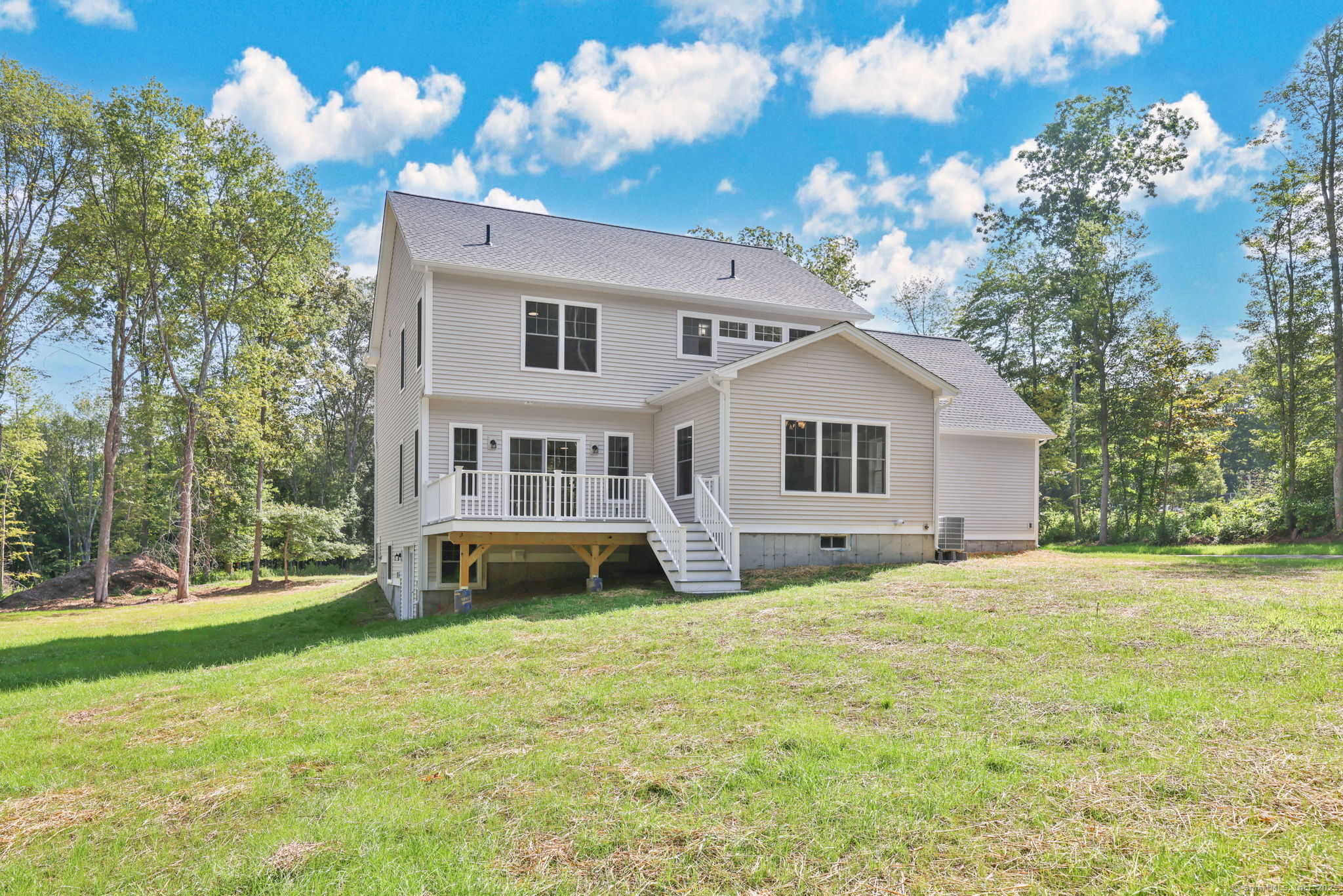 43 Wyllys Farm Road Storrs Mansfield, CT 06268 - Photo 3 of 40 a front view of a house with a yard and garage