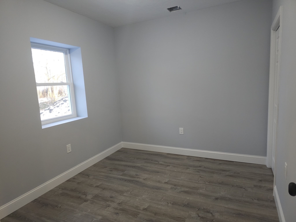 32 West Street, Unit 3 Middleboro, MA 02346 - Photo 5 of 8 an empty room with a window