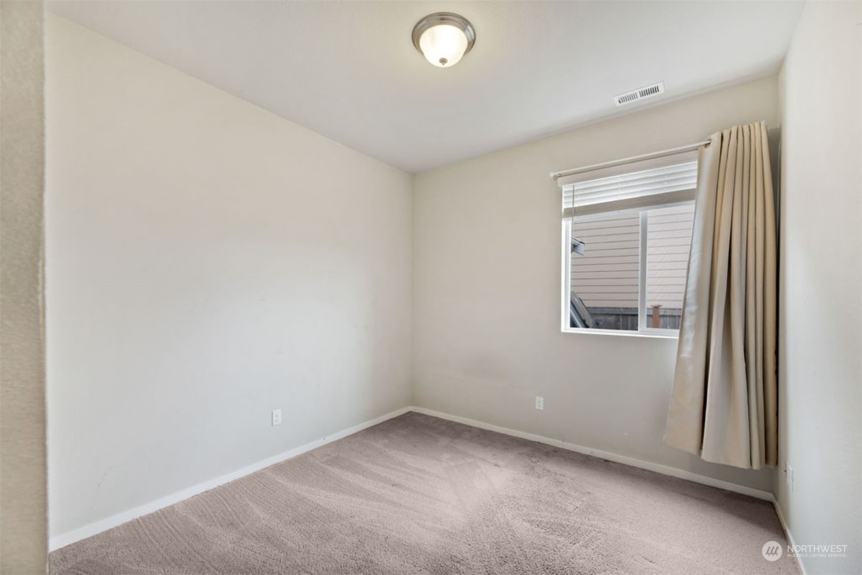 10305 Messner Avenue Granite Falls, WA 98252 - Photo 14 of 23 an empty room with a window