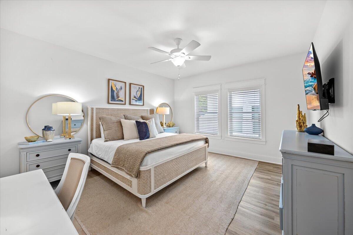 12 Caba Cove Santa Rosa Beach, FL 32459 - Photo 22 of 37 a bed room with a bed and a chandelier