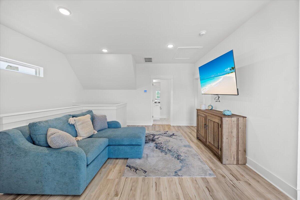 12 Caba Cove Santa Rosa Beach, FL 32459 - Photo 28 of 37 a living room with furniture and a flat screen tv