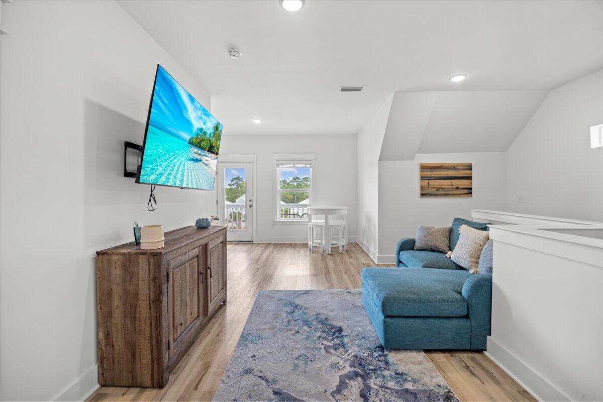 12 Caba Cove Santa Rosa Beach, FL 32459 - Photo 30 of 37 a living room with furniture and a flat screen tv