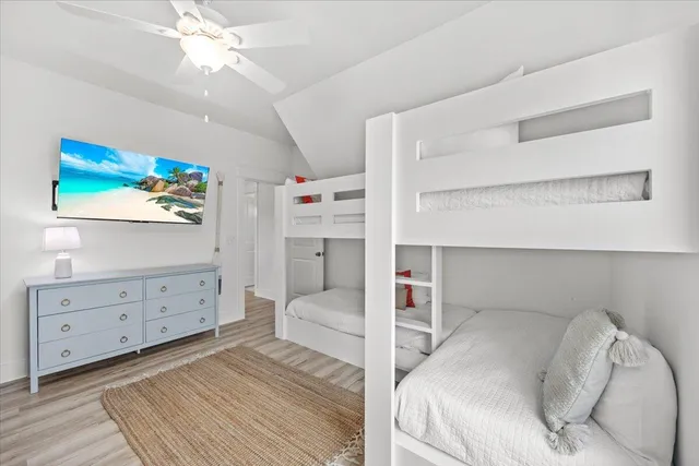 a bedroom with a bed and a cabinets