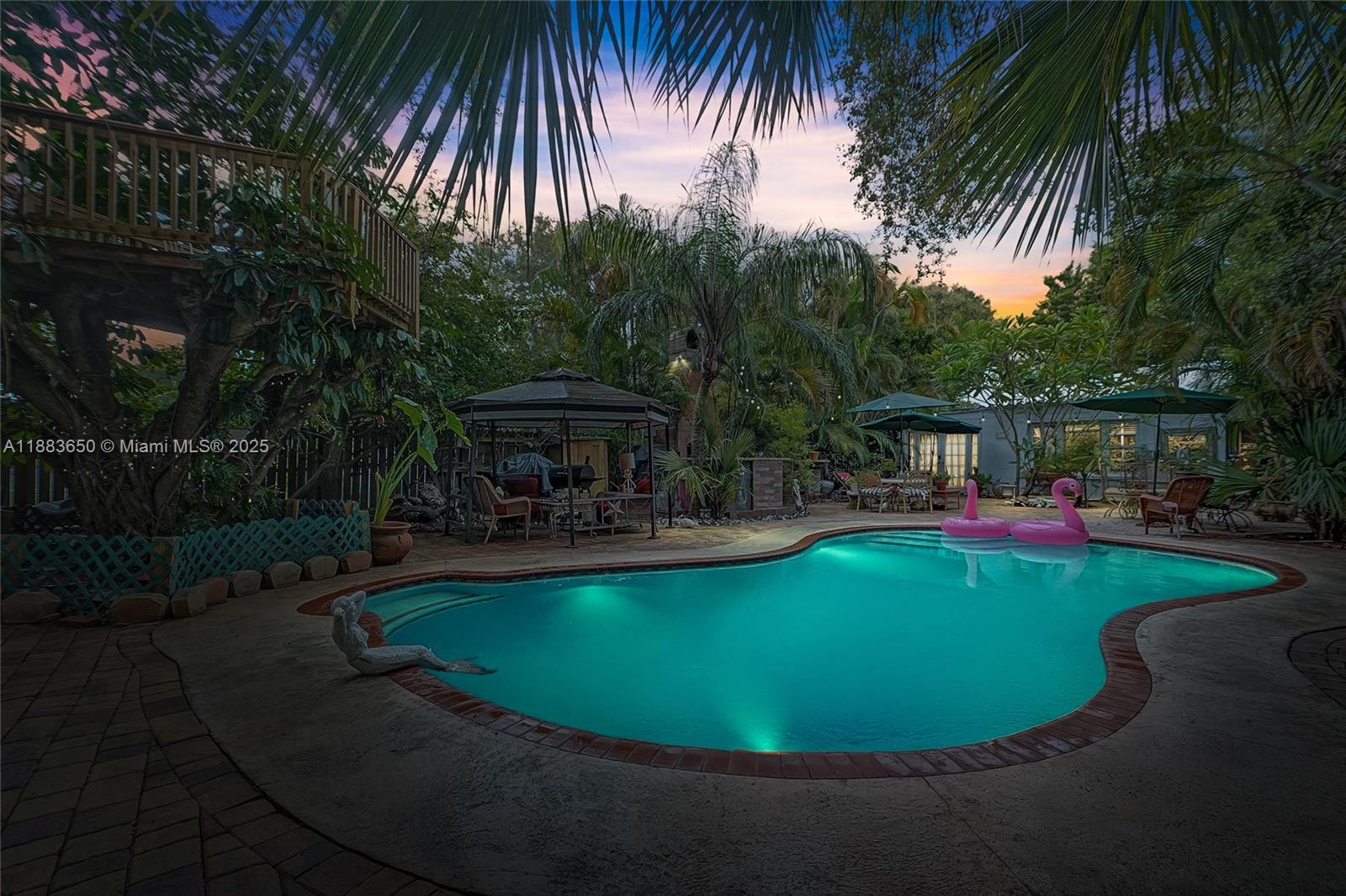 9156 Northwest 3rd Avenue Miami, FL 33150 - Photo 1 of 26 a view of a swimming pool with sitting area