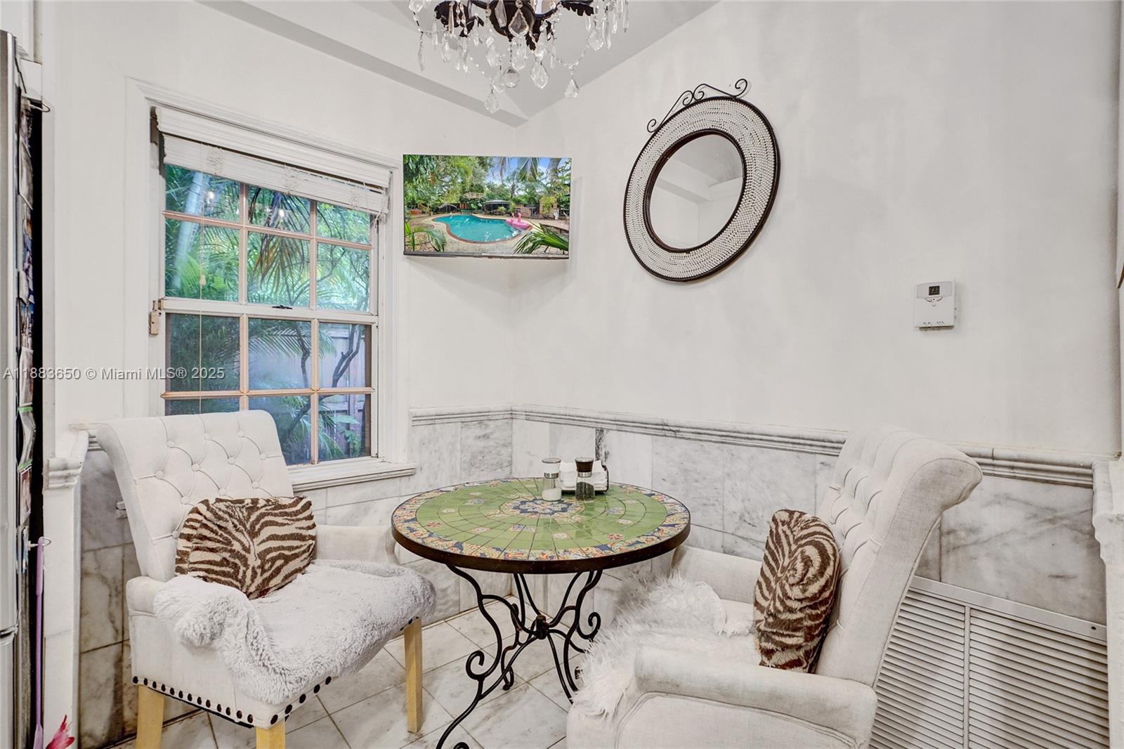 9156 Northwest 3rd Avenue Miami, FL 33150 - Photo 13 of 26 a living room with furniture and a window