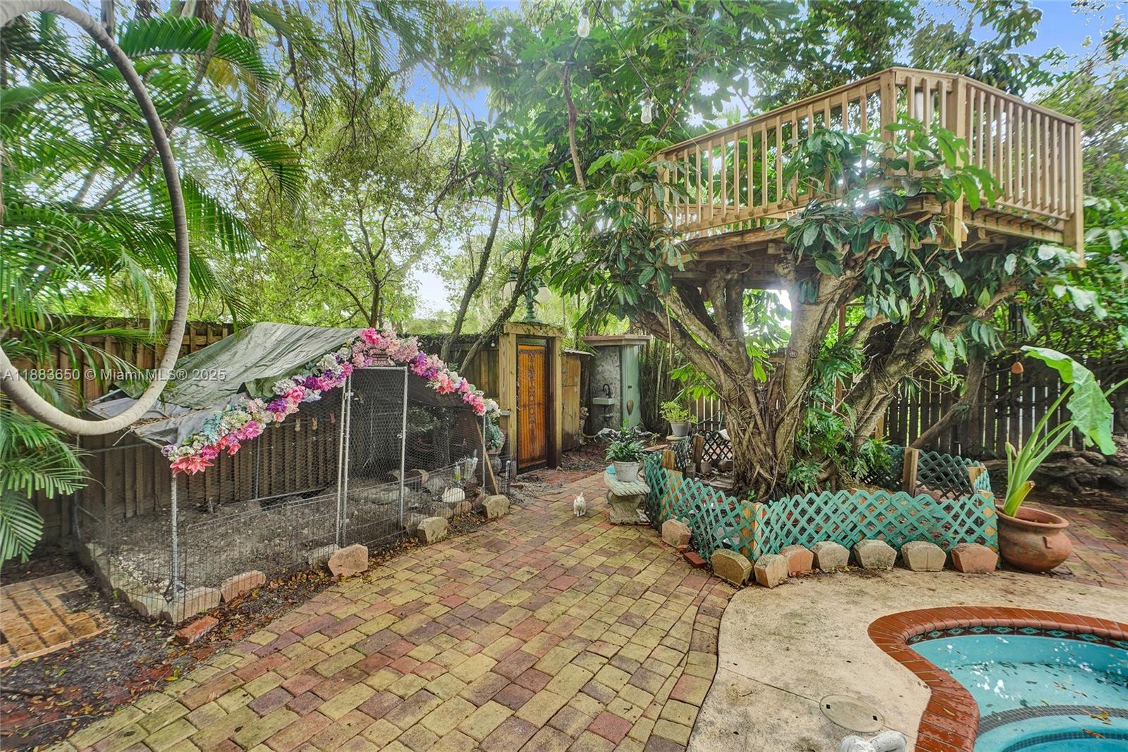 9156 Northwest 3rd Avenue Miami, FL 33150 - Photo 22 of 26 a childrens park with lots of swings and slides