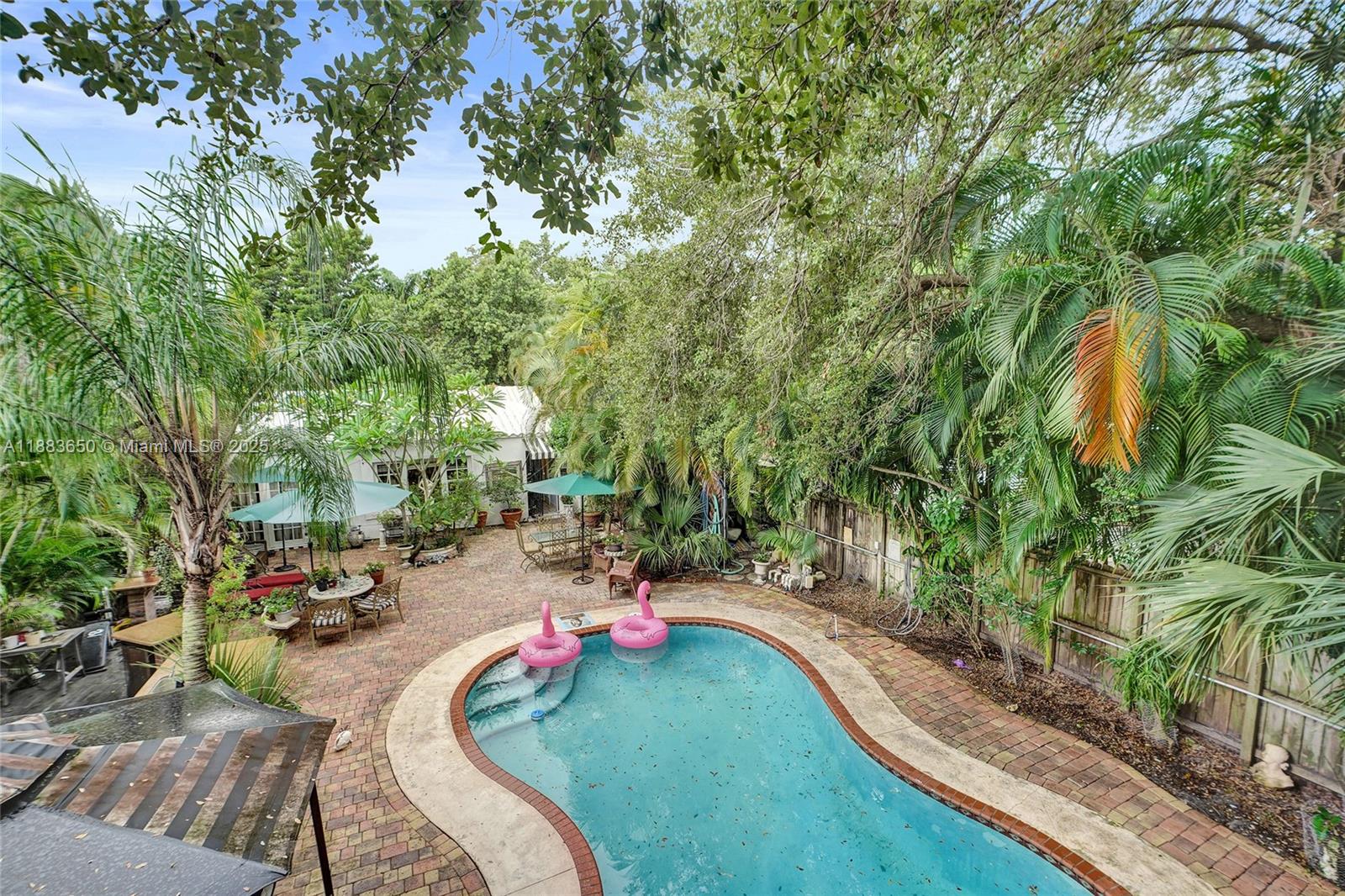 9156 Northwest 3rd Avenue Miami, FL 33150 - Photo 3 of 26 a view of a backyard with sitting area