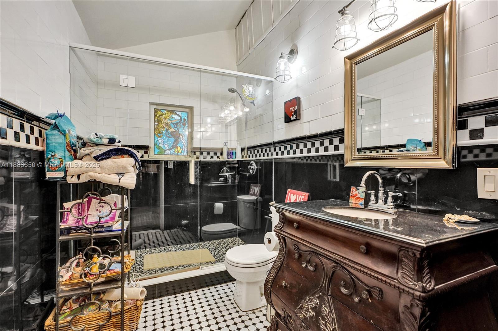 9156 Northwest 3rd Avenue Miami, FL 33150 - Photo 10 of 26 a table and chairs in a room