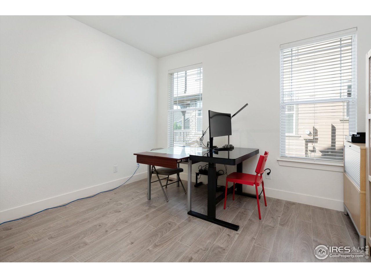 2159 Summerlin Lane Longmont, CO 80503 - Photo 17 of 37 a workspace with furniture window and outside view