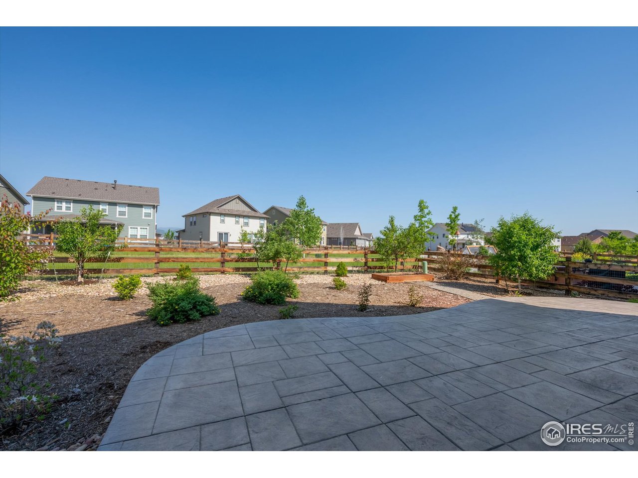 2159 Summerlin Lane Longmont, CO 80503 - Photo 34 of 37 a view of an outdoor space and a yard