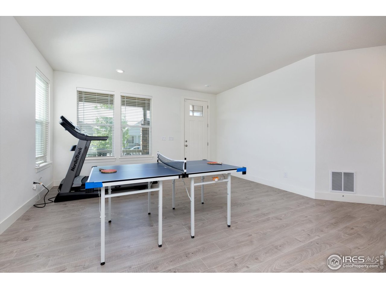 2159 Summerlin Lane Longmont, CO 80503 - Photo 5 of 37 a view of a room with gym equipment