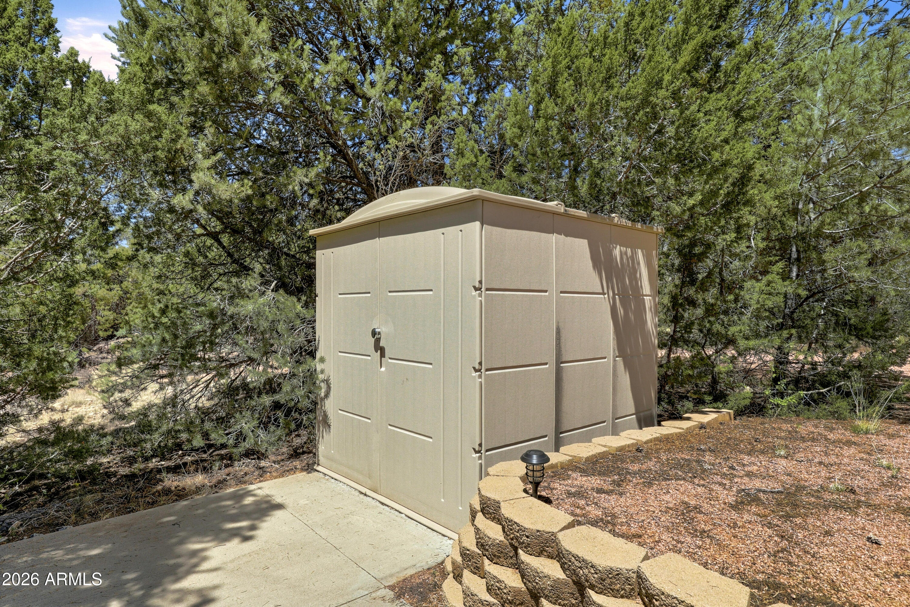 1992 Red Deer Run Overgaard, AZ 85933 - Photo 27 of 35 a house with a outdoor space