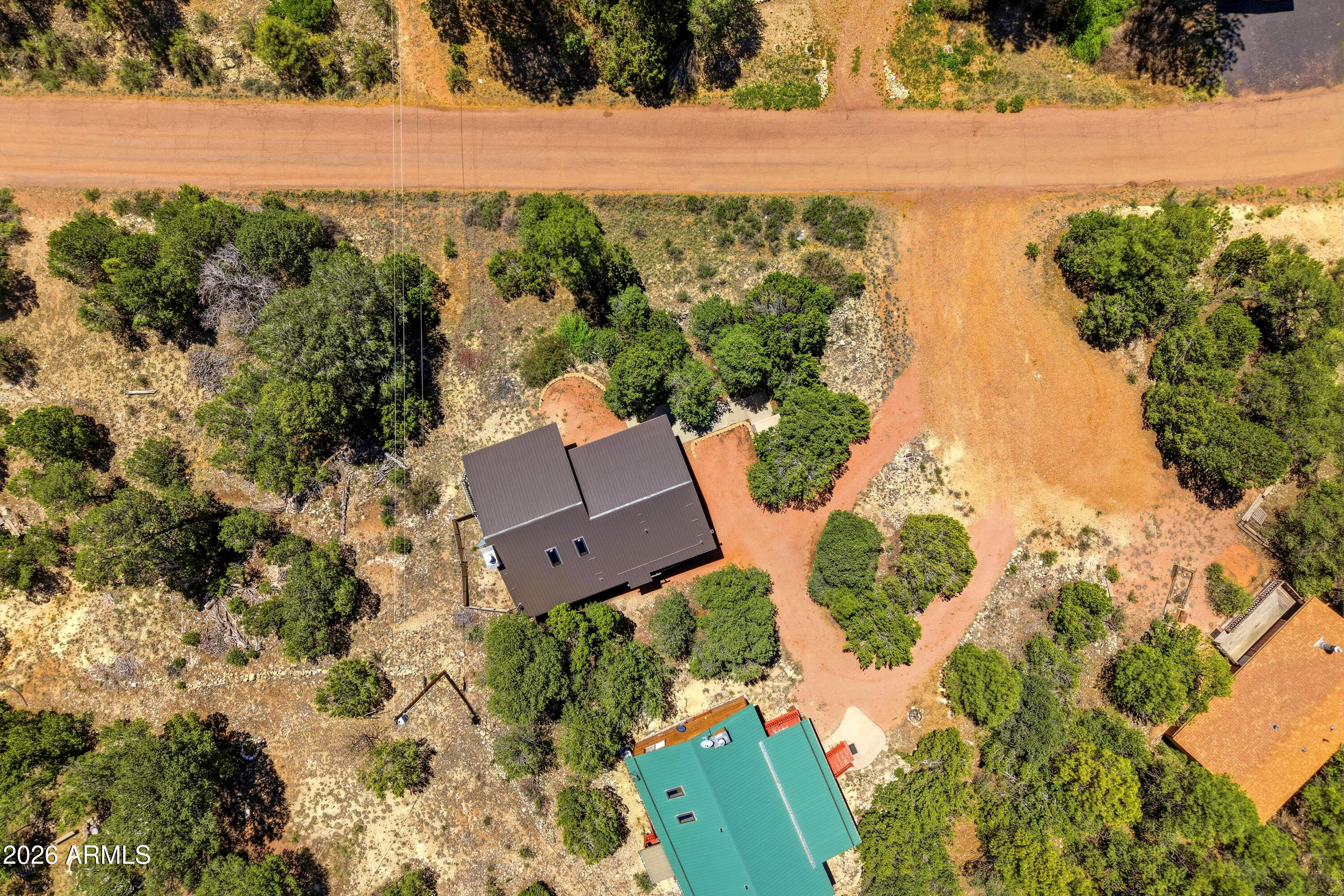 1992 Red Deer Run Overgaard, AZ 85933 - Photo 28 of 35 an aerial view of a house with a lake view