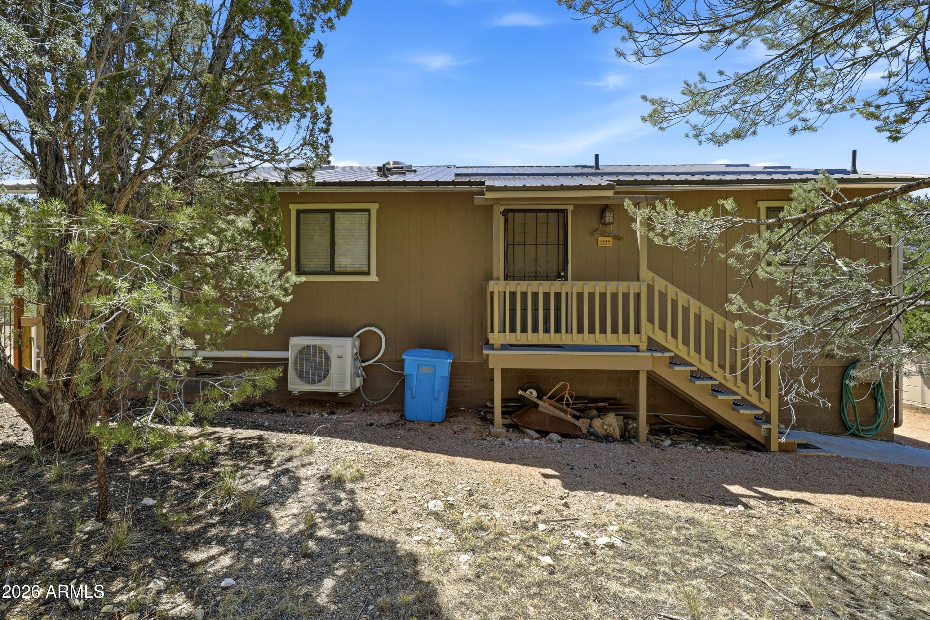 1992 Red Deer Run Overgaard, AZ 85933 - Photo 3 of 35 a view of a chair and table in backyard