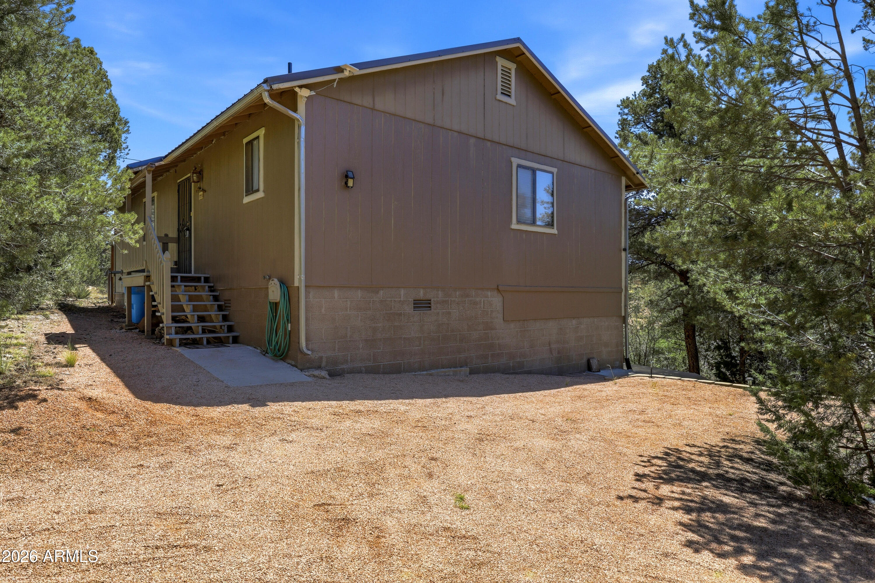1992 Red Deer Run Overgaard, AZ 85933 - Photo 4 of 35 a view of backyard of house