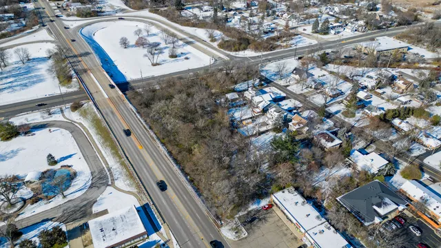 an aerial view of a highlighted house