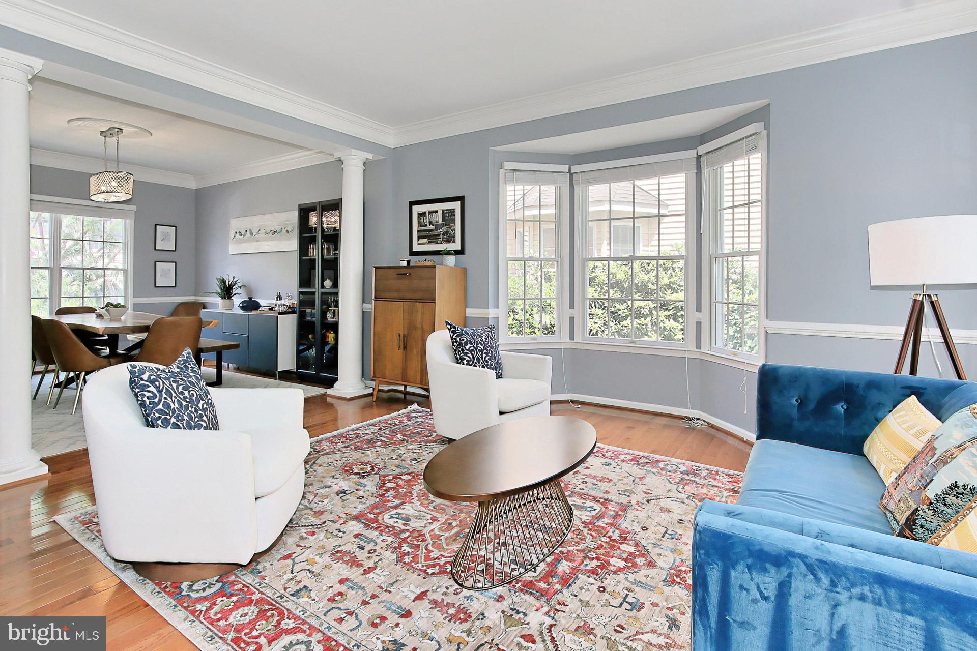 Spacious Living Room Opens to the Dining Room