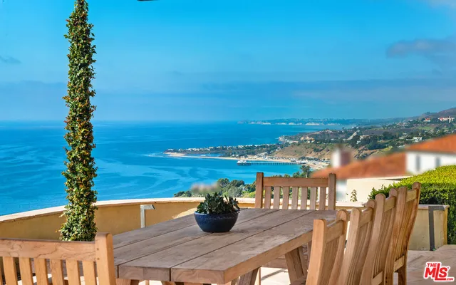 a view of a ocean from a balcony