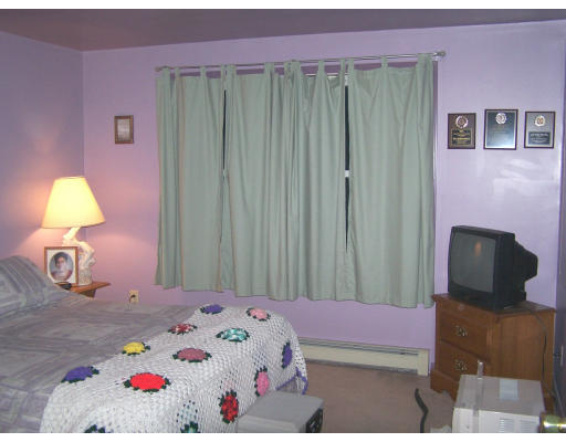 710 Royalston Road Phillipston, MA 01331 - Photo 18 of 25 a bedroom with a bed and dresser