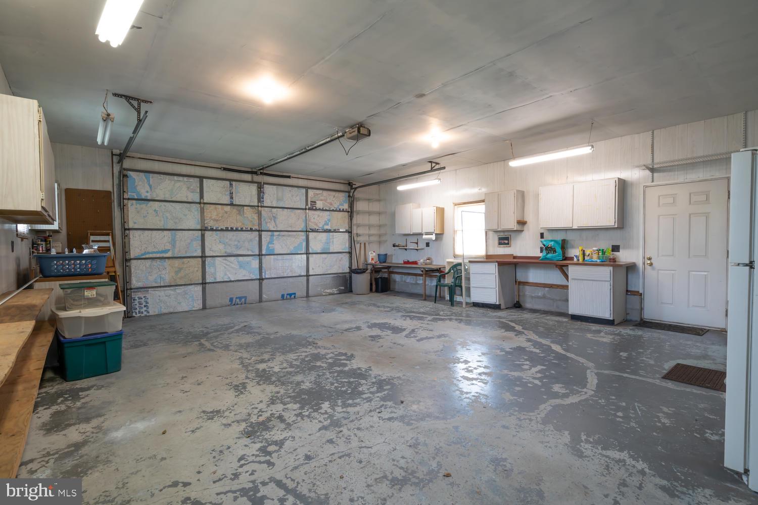 32058 Warren Road Millville, DE 19967 - Photo 19 of 29 Garage is 24 x 27 with built-in storage!