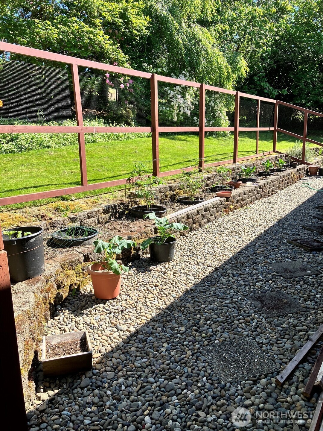 1171 Ray Hicks Street Raymond, WA 98577 - Photo 24 of 33 a view of a backyard with sitting area