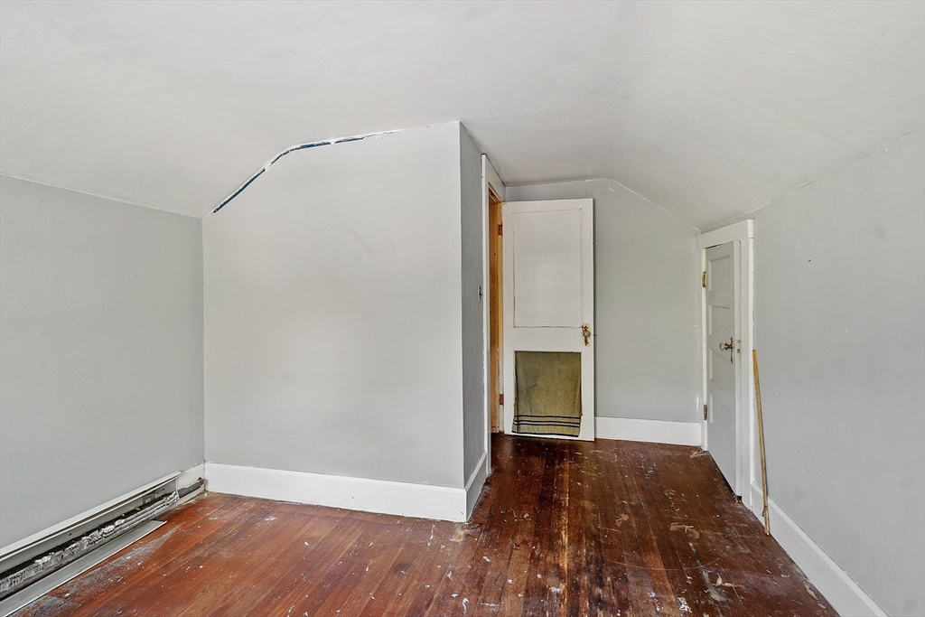 31 South Street Townsend, MA 01469 - Photo 25 of 42 a view of an empty room with wooden floor and a window