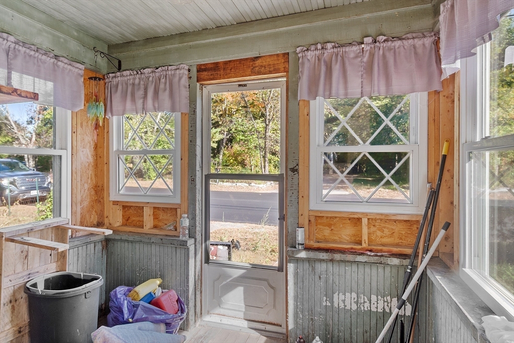 31 South Street Townsend, MA 01469 - Photo 26 of 42 a living room with a window and a table