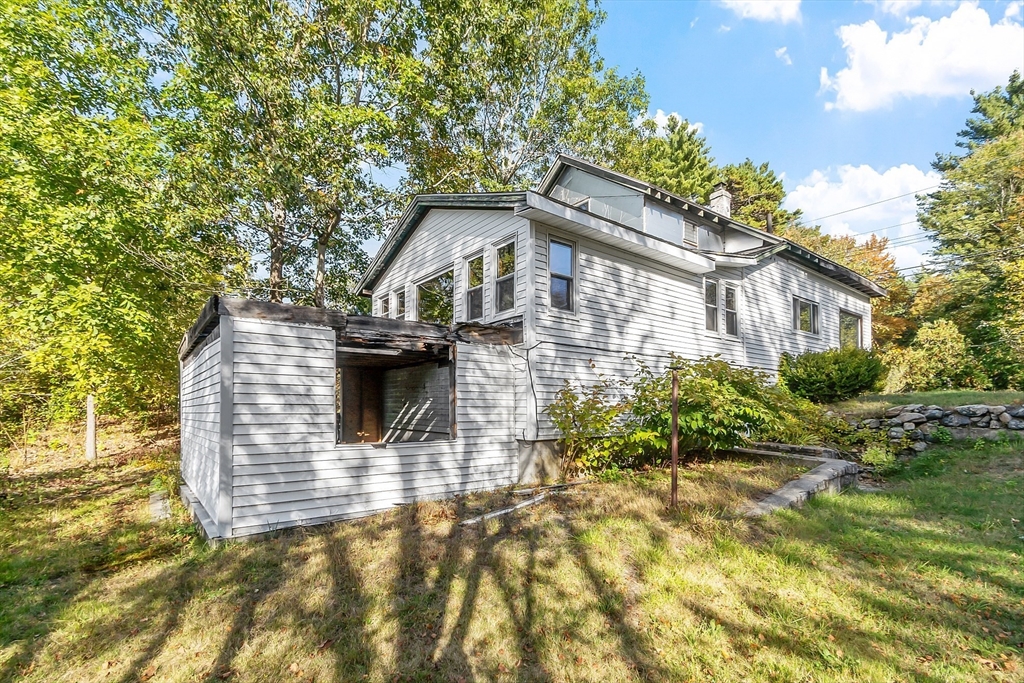31 South Street Townsend, MA 01469 - Photo 29 of 42 a front view of a house with a yard