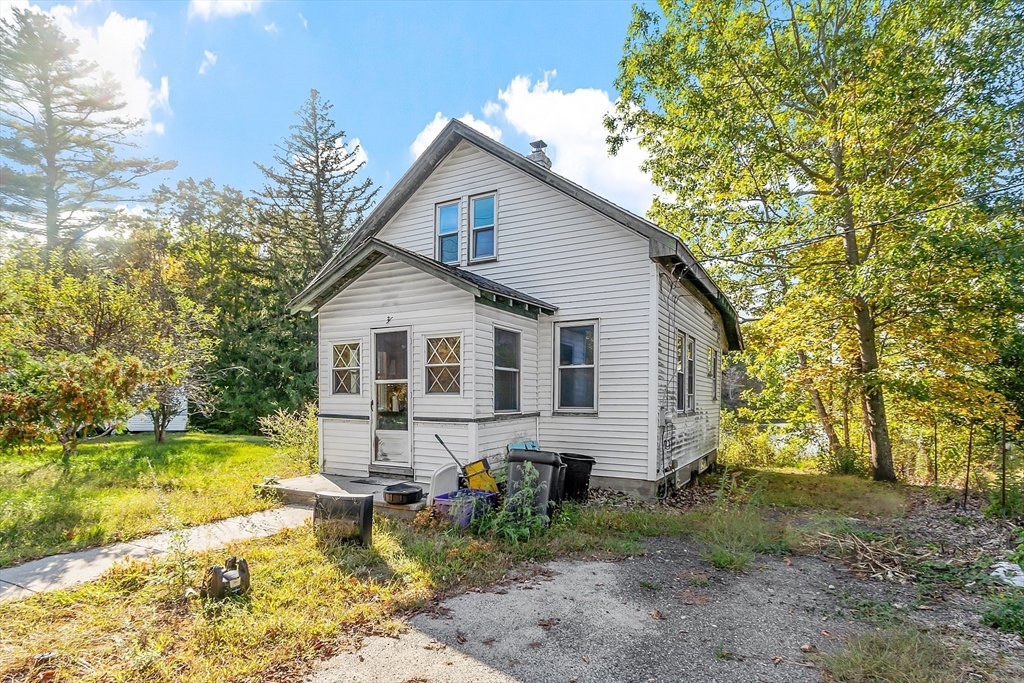 31 South Street Townsend, MA 01469 - Photo 41 of 42 a view of a house with backyard and sitting area