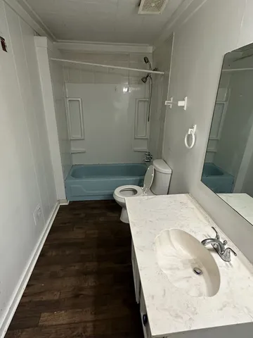 a bathroom with a sink and mirror
