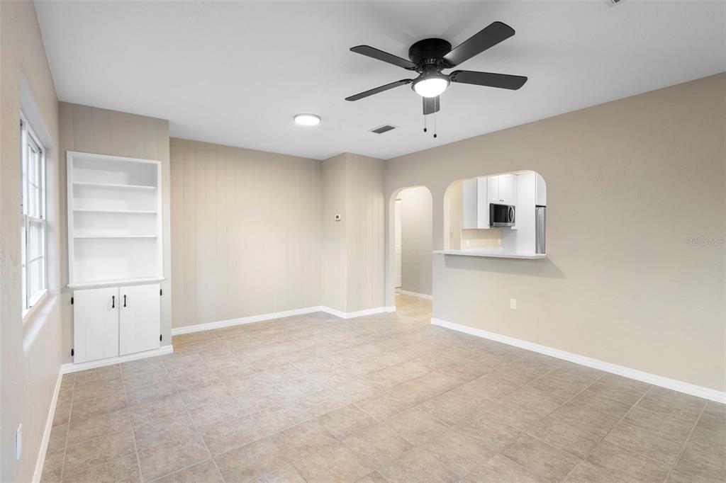 124 Evergreen Avenue Edgewater, FL 32132 - Photo 11 of 36 an empty room with closet and windows