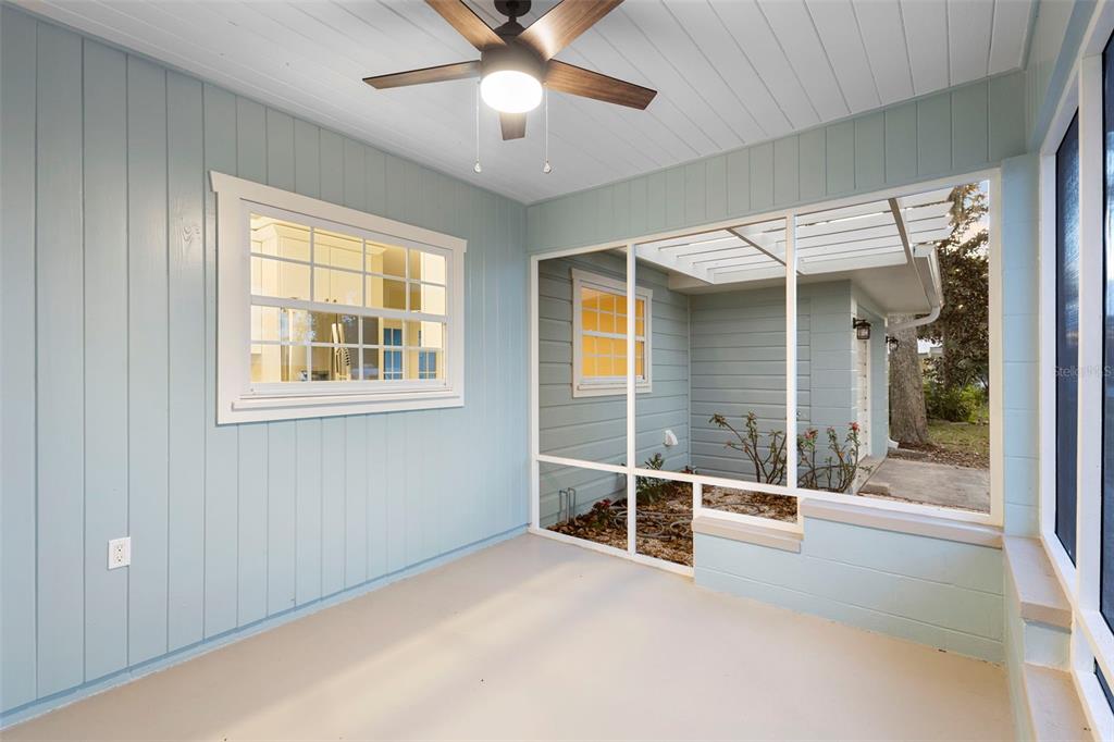 124 Evergreen Avenue Edgewater, FL 32132 - Photo 21 of 36 a view of a livingroom with a ceiling fan and window
