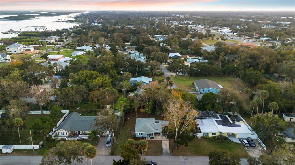 124 Evergreen Avenue Edgewater, FL 32132 - Photo 31 of 36 an aerial view of residential houses with outdoor space