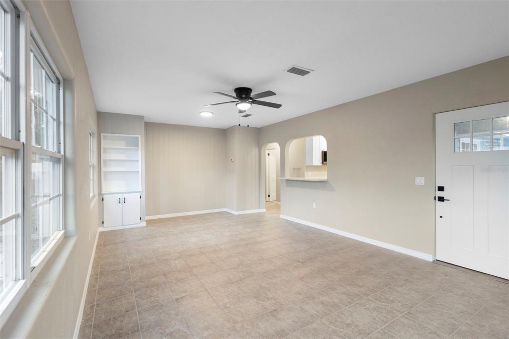 124 Evergreen Avenue Edgewater, FL 32132 - Photo 9 of 36 a view of an empty room with a window