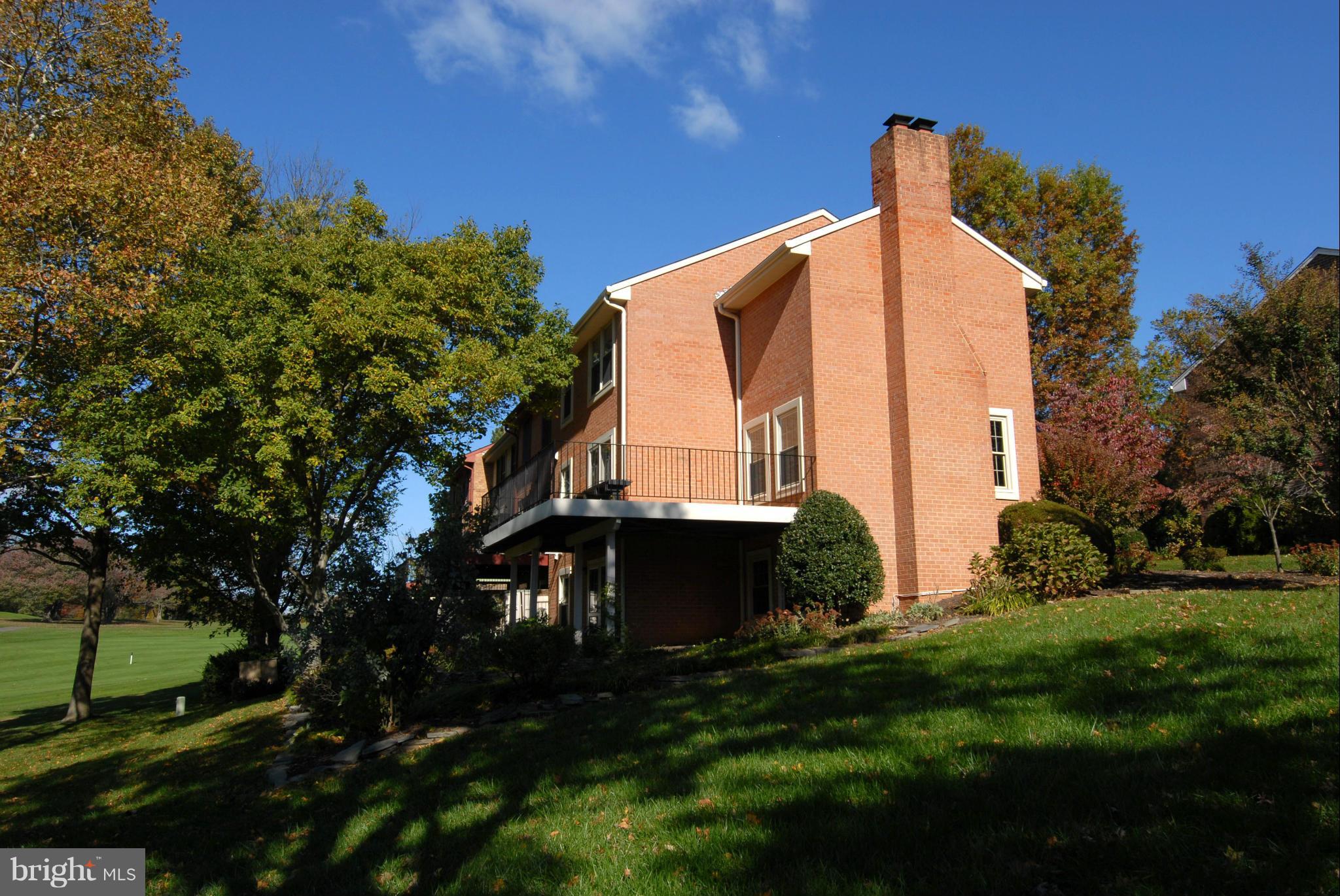 2152 Golf Course Drive Reston, VA 20191 - Photo 2 of 27 a view of a house with a yard