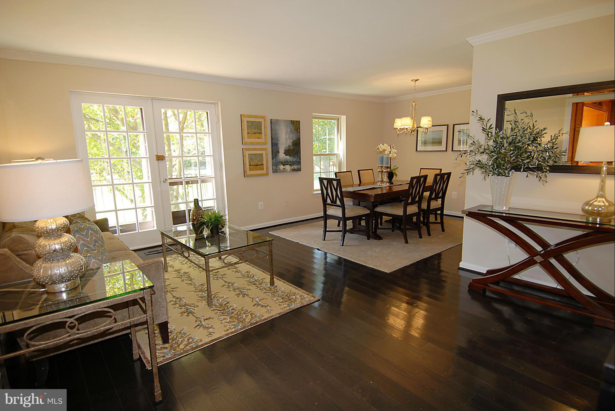 2152 Golf Course Drive Reston, VA 20191 - Photo 11 of 27 a living room with furniture and a flat screen tv