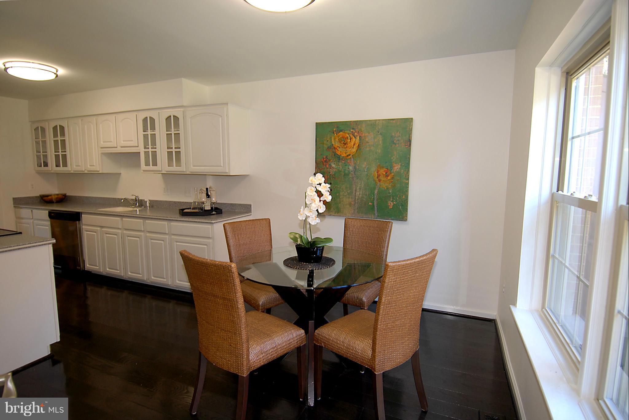 2152 Golf Course Drive Reston, VA 20191 - Photo 14 of 27 a dining room with furniture and window