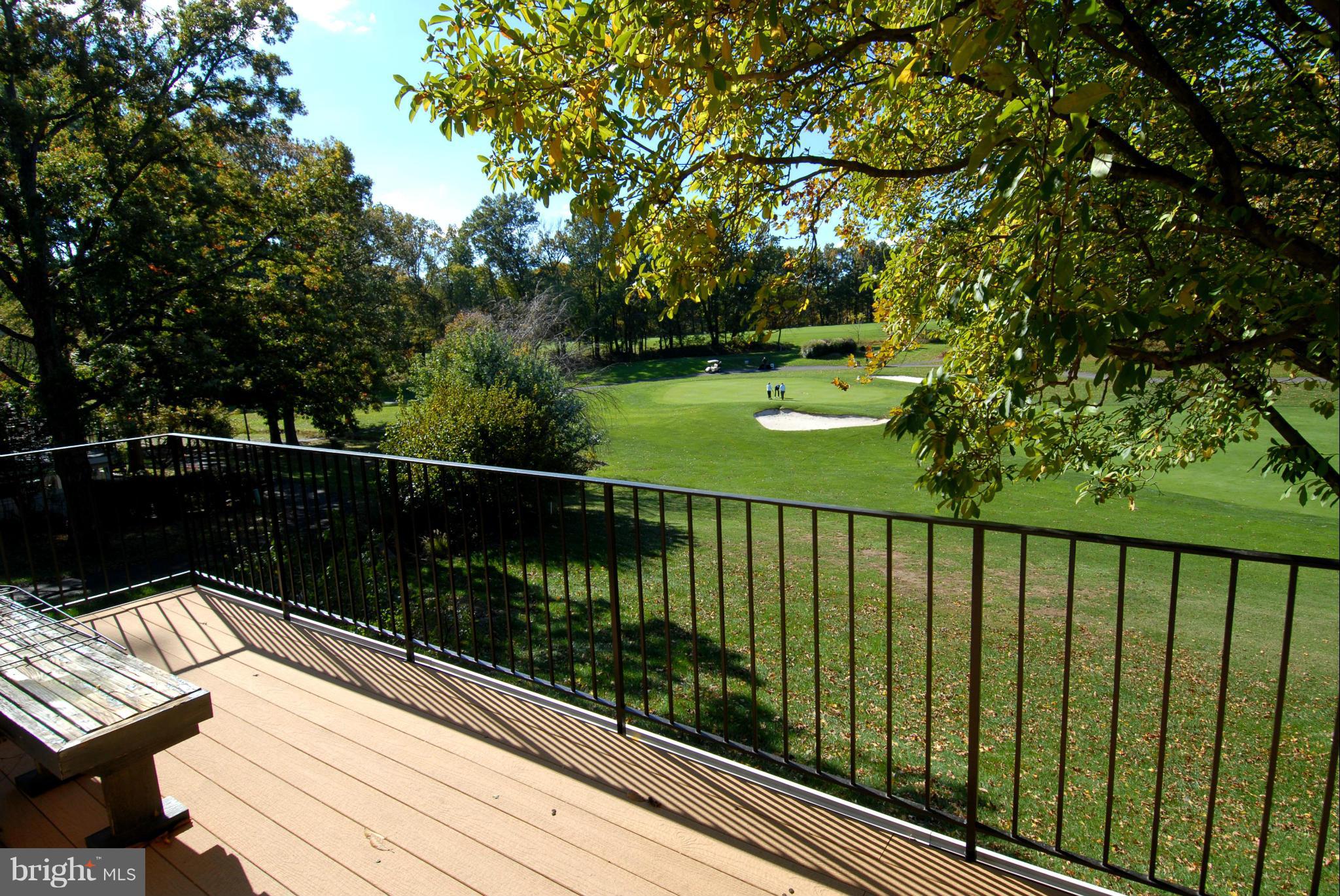 2152 Golf Course Drive Reston, VA 20191 - Photo 26 of 27 a view of balcony with wooden floor and fence