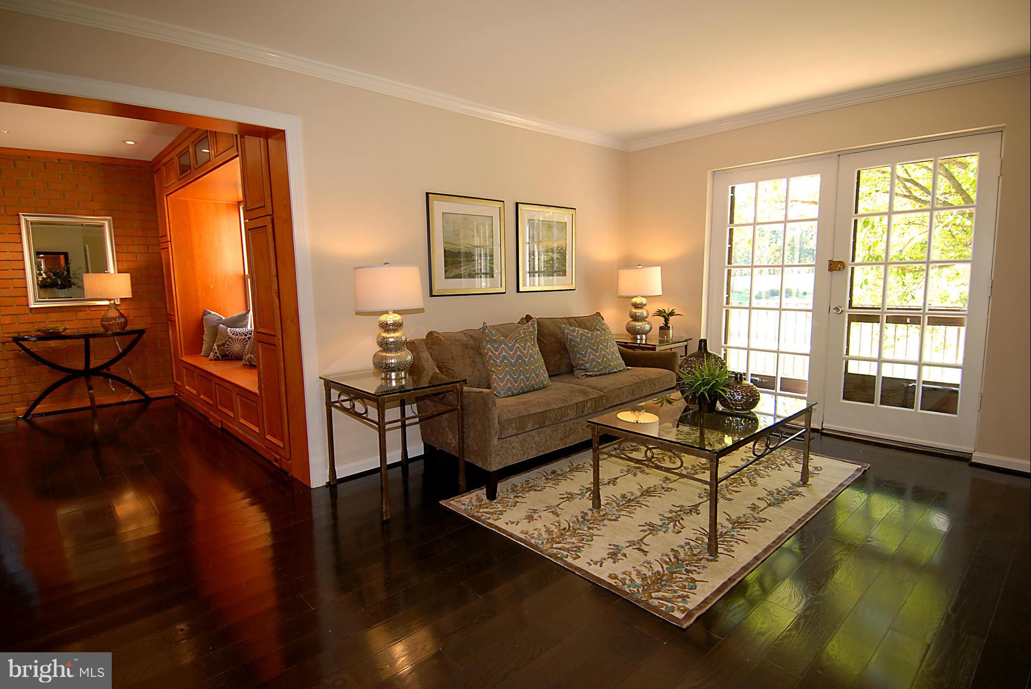 2152 Golf Course Drive Reston, VA 20191 - Photo 5 of 27 a living room with furniture and a window