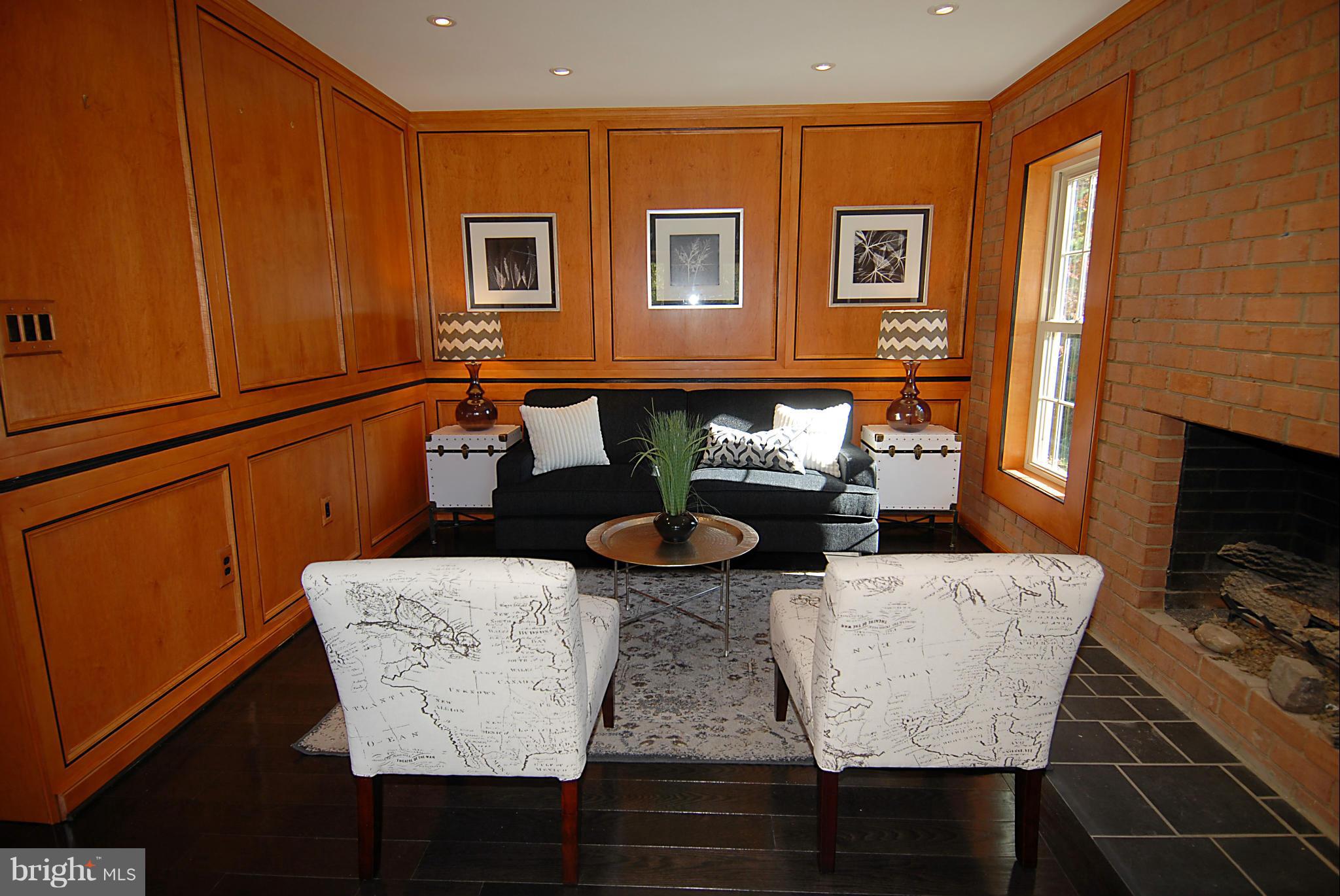 2152 Golf Course Drive Reston, VA 20191 - Photo 6 of 27 a living room with furniture and a fireplace