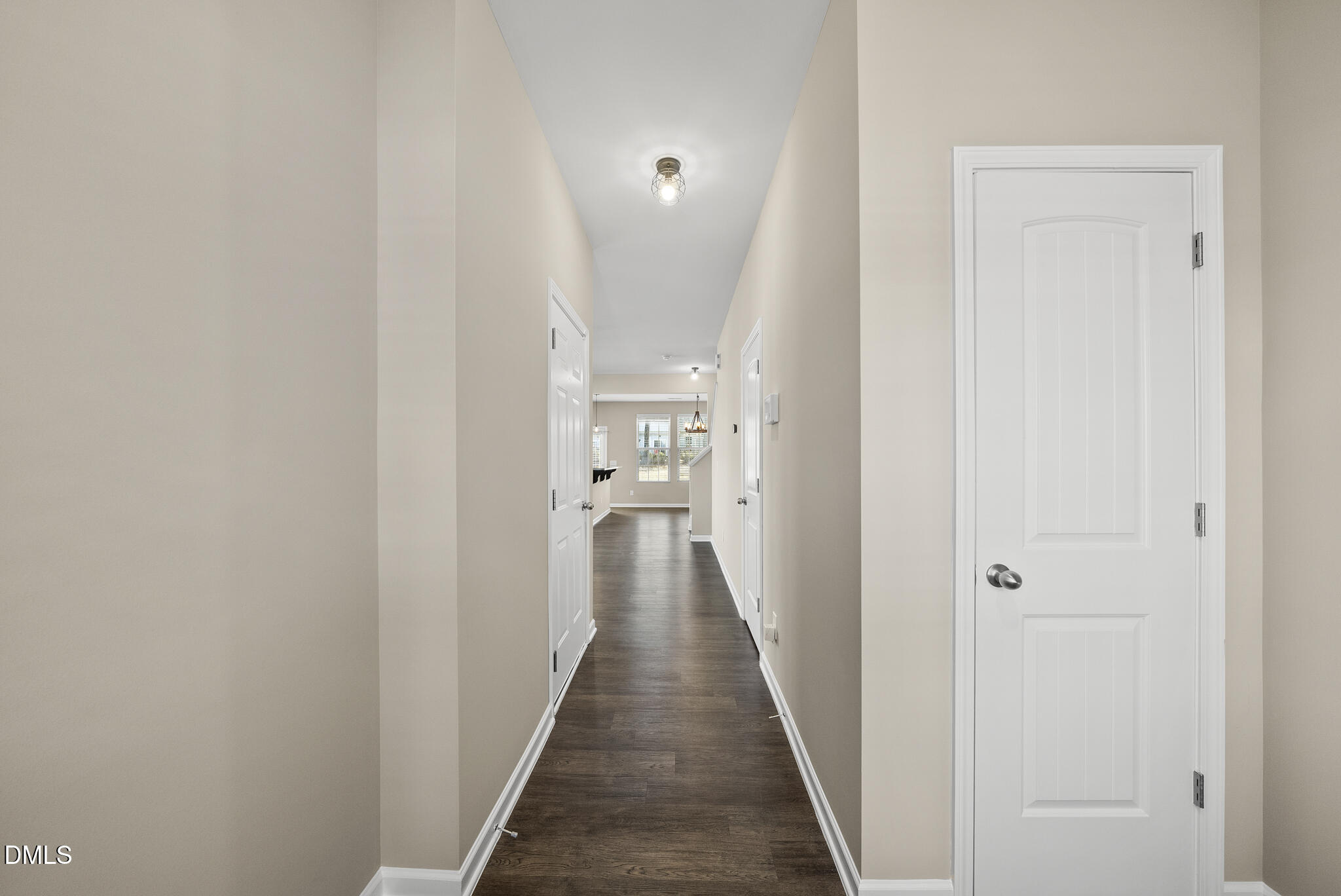 1044 Grand Ridge Drive Rolesville, NC 27571 - Photo 14 of 31 a view of a hallway with wooden floor and closet