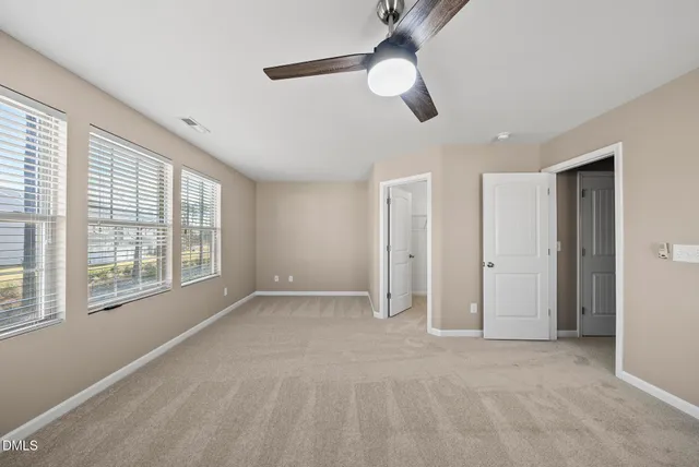 a bathroom with a sink double vanity and a mirror