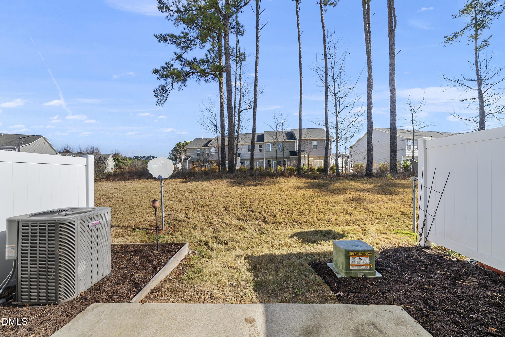 1044 Grand Ridge Drive Rolesville, NC 27571 - Photo 27 of 31 a view of a terrace with wooden fence